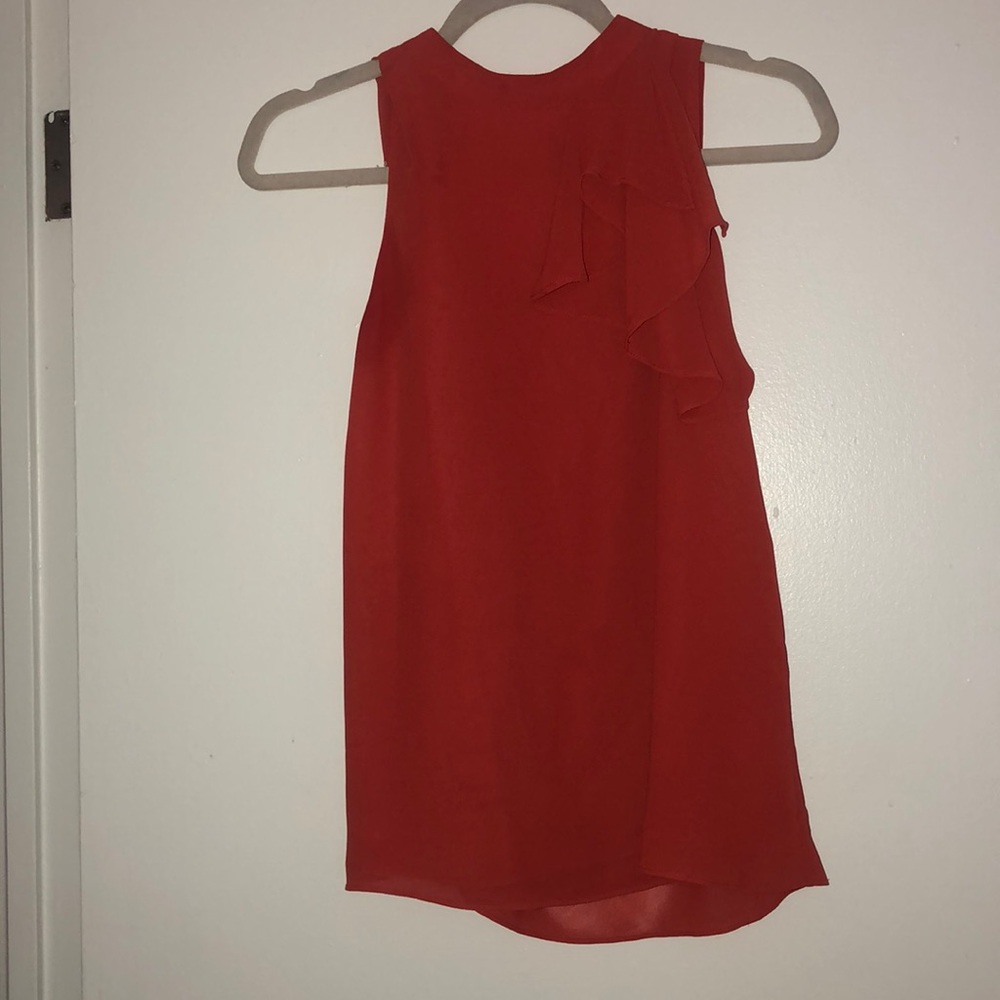 Orange sleeveless blouse